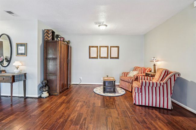 Flexible space can be used as game area, reading nook, or formal dining. | Image 7