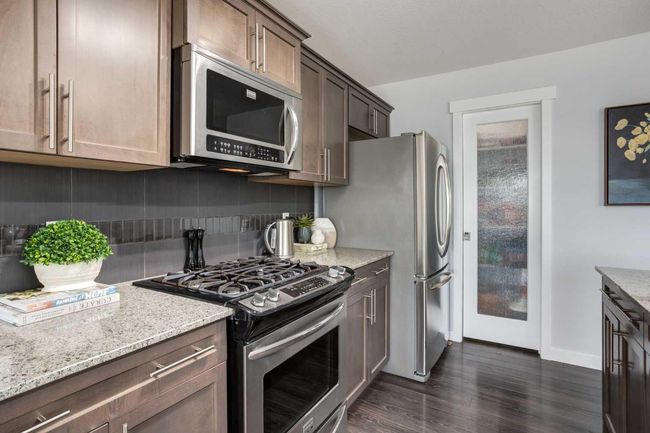 251 Kingsbridge Rd Se, Home with 2 bedrooms, 3 bathrooms and 2 parking in Airdrie AB | Image 7