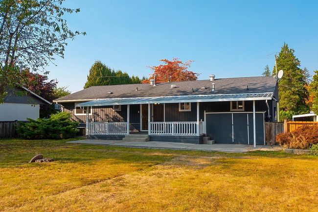 Rear view of property with a porch | Image 29