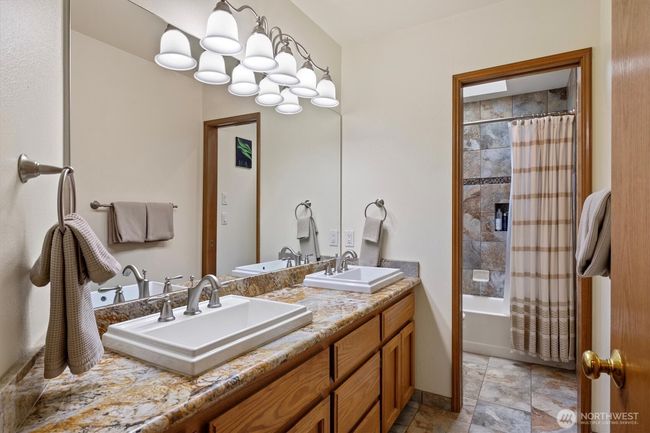 Main Bath, updated w/ heated floors and tile | Image 24