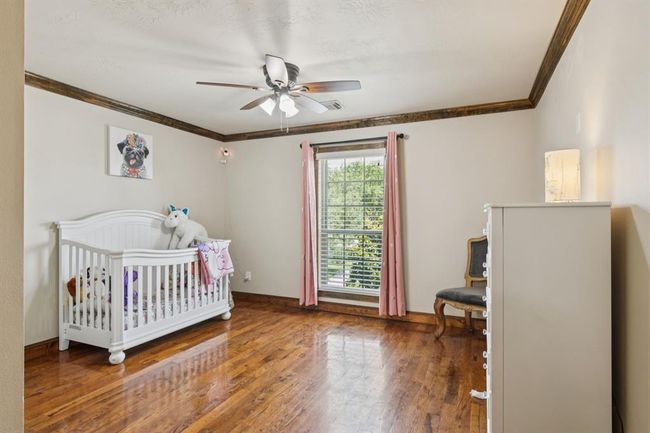 Check out the crown molding and beautiful flooring. | Image 32