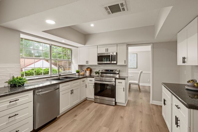 There's ample cabinet and counter space for preparing fresh meals! | Image 13