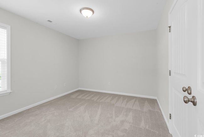 Spare room with carpet floors and baseboards | Image 20