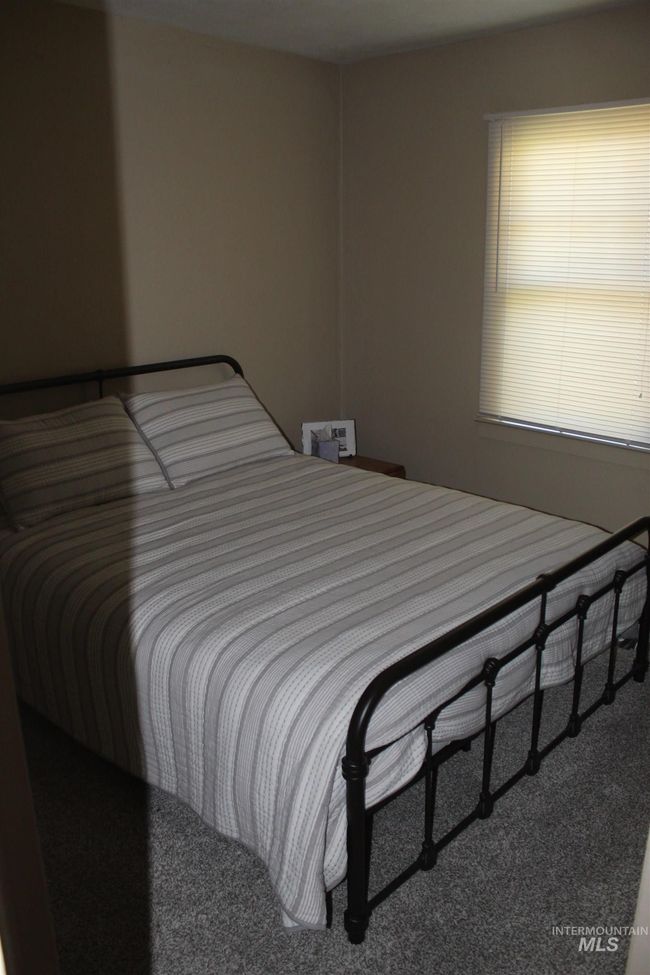 View of carpeted bedroom | Image 9