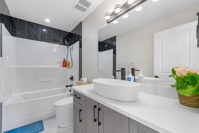 316 Kinniburgh Link, House other with 5 bedrooms, 4 bathrooms and 6 parking in Chestermere AB | Image 37