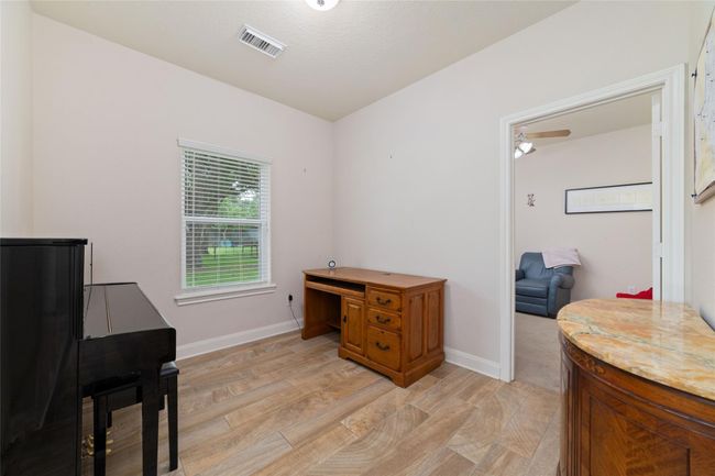 Piano/flex room between bedrooms 3 & 4. | Image 28