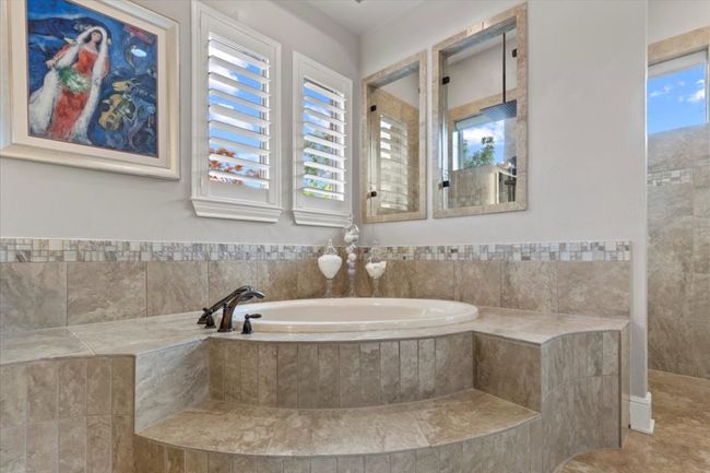Bathroom featuring a garden tub | Image 20