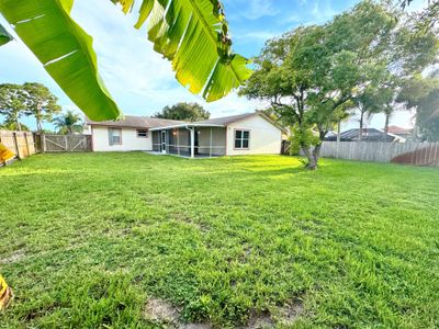 471 Se Langfield Avenue, House other with 4 bedrooms, 3 bathrooms and null parking in Port St Lucie FL | Image 2