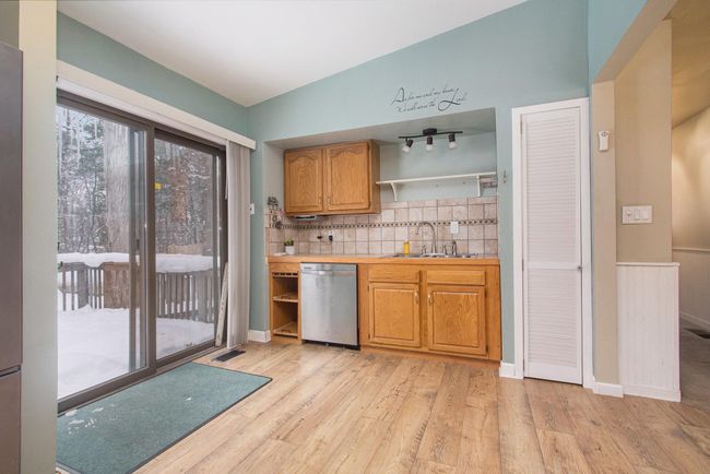 Kitchen with walkout to deck | Image 13
