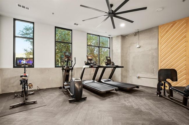 Exercise room featuring ceiling fan and recessed lighting | Image 24