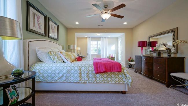 Bedroom featuring carpet flooring, a ceiling fan, and recessed lighting | Image 20