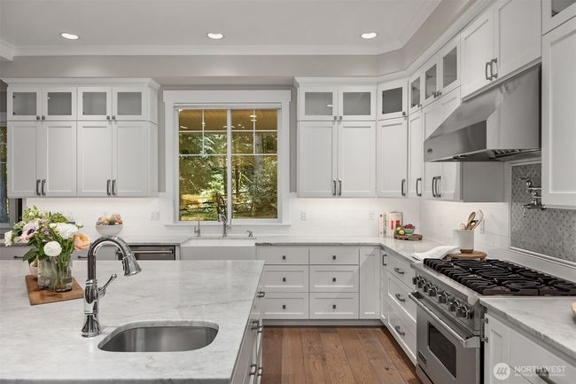 Perfectly designed to include a prep sink and pot filler. | Image 12