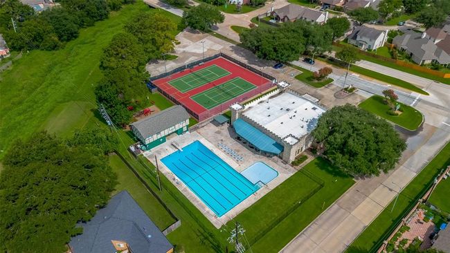 Wonderful neighborhood amenities include an Olympic size lap pool, tennis & pickleball courts, a playground and basketball courts. | Image 48