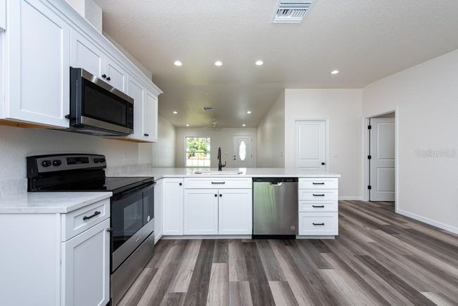 7230 Apache Trl, House other with 4 bedrooms, 2 bathrooms and null parking in SPRING HILL FL | Image 14