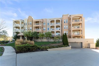 View of property with a garage | Image 1