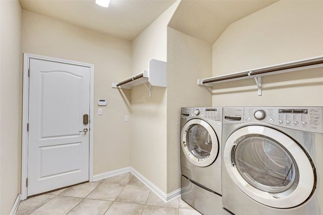 Spacious laundry area | Image 39