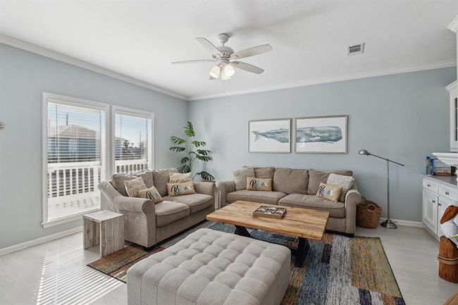 The windows feature storm shutters, adding protection to your home. | Image 4