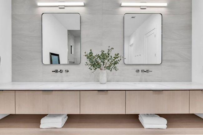 Primary Bathroom featuring tasteful backsplash, and double vanity | Image 25