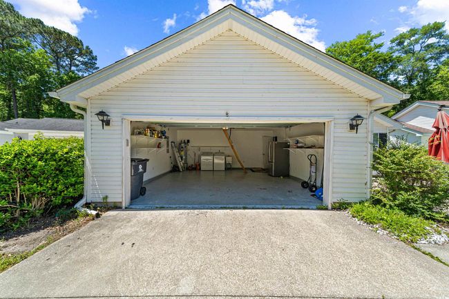 Detached garage with freestanding refrigerator | Image 36