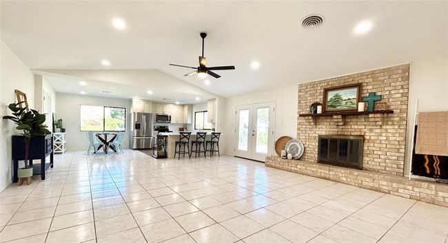 Another view of the spacious open living and dining area | Image 5
