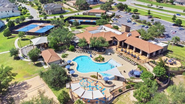 Aerial view of residential area featuring a pool area | Image 39