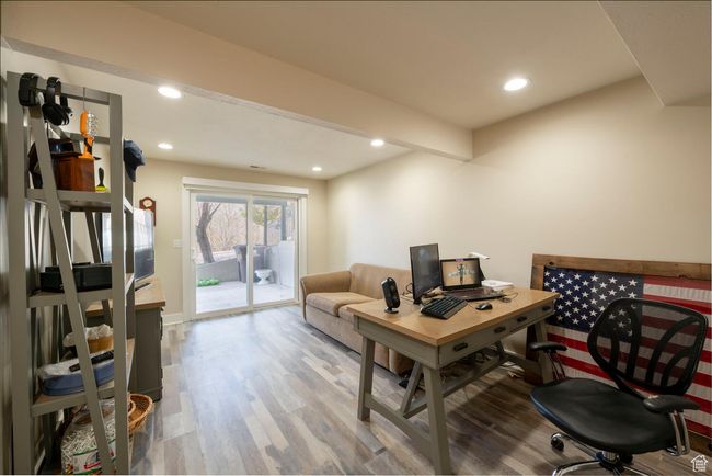 Office area with recessed lighting and wood finished floors | Image 33