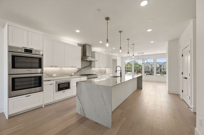 Sophisticated design and luxurious finishes are the hallmark of this dream kitchen! | Image 10