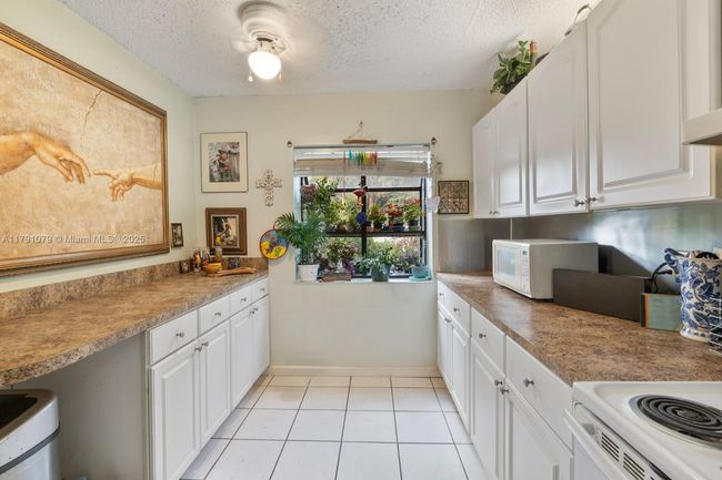 2834 - 3705 Carambola Cir N, Townhouse with 3 bedrooms, 3 bathrooms and null parking in Coconut Creek FL | Image 5