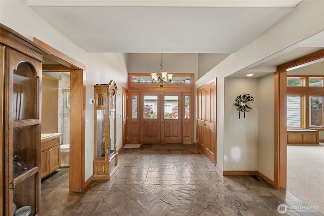 Entry way with slate flooring. | Image 6
