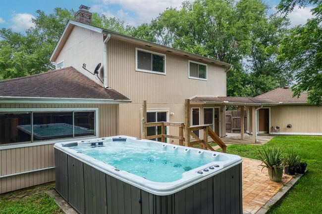 Spacious backyard with swim spa | Image 32