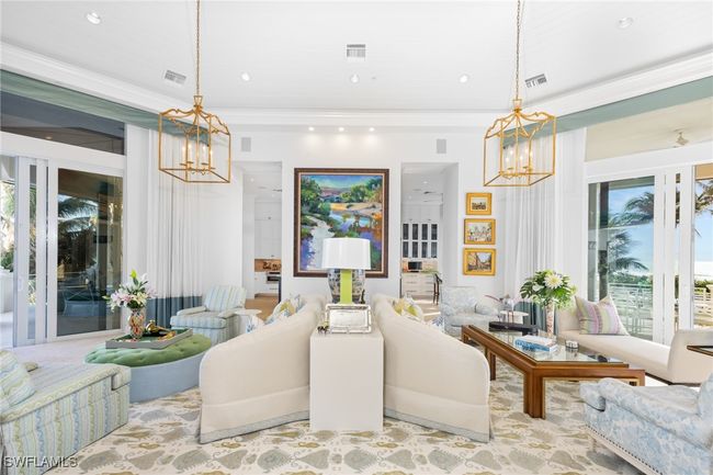 Stunning Living Room with loads of light, island views, custom finishes | Image 14