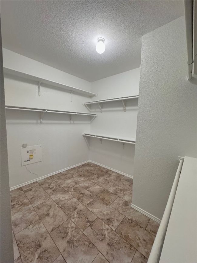 View of spacious closet | Image 18
