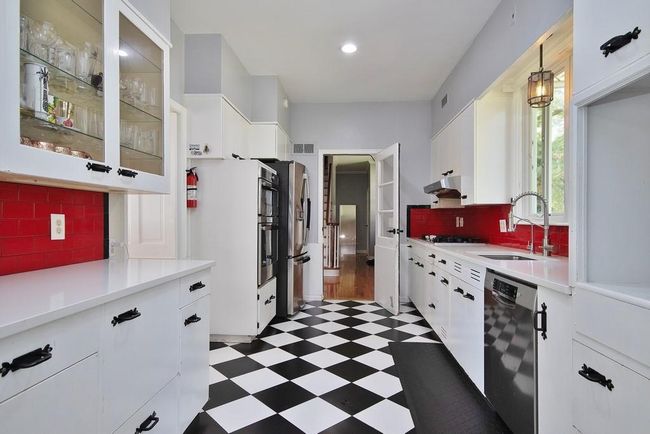 Tile floors and stainless appliances in Kitchen | Image 4