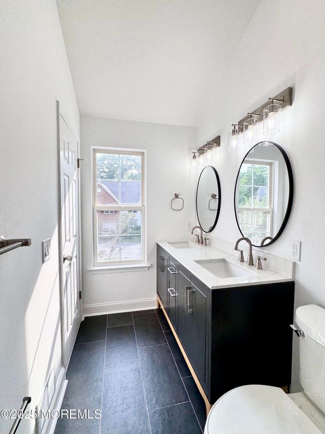 Primary bath looking toward window | Image 21