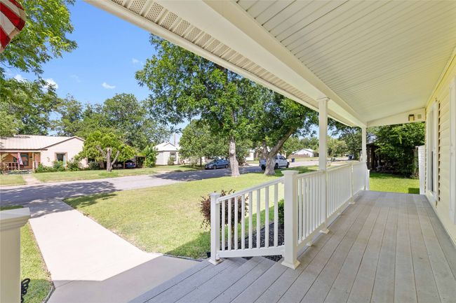 Porch featuring a yard and a residential view | Image 8