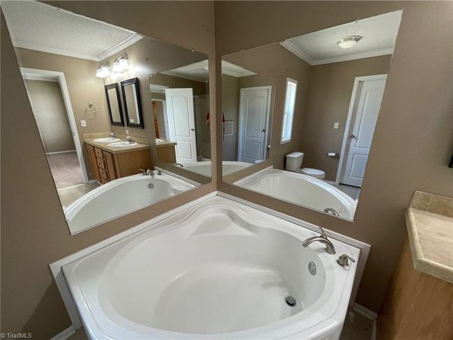 8004 Smithstone Ct, House other with 3 bedrooms, 2 bathrooms and null parking in Summerfield NC | Image 12
