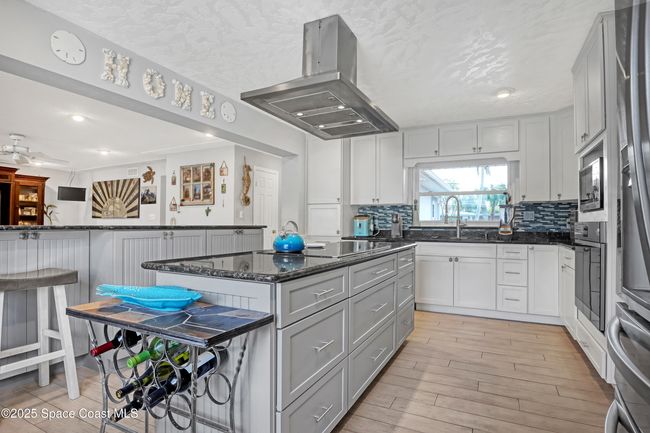 1061 Bali Rd, House other with 4 bedrooms, 2 bathrooms and null parking in Cocoa Beach FL | Image 21