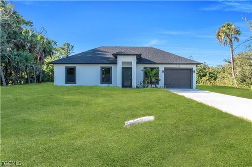 644 Woodcrest Dr, Lehigh Acres, FL, 33972-1073 | Card Image