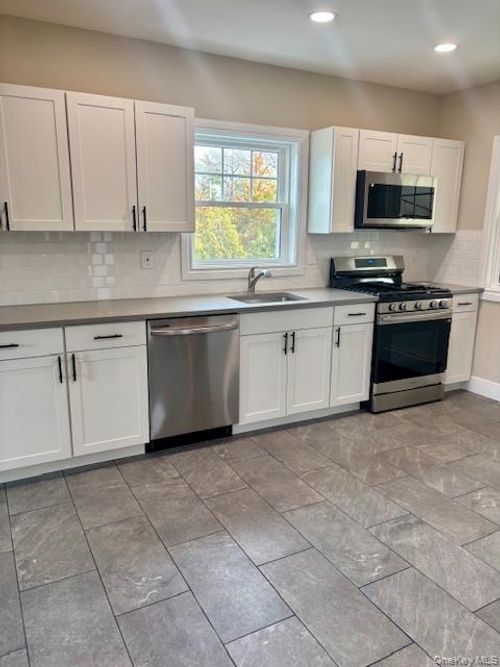 1026 Glen Cove Ave, Glen Head, NY, 11545-1565 | Card Image