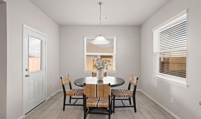 Sun-lit dining area (*Photo not of actual home and used for illustration purposes only.) | Image 8