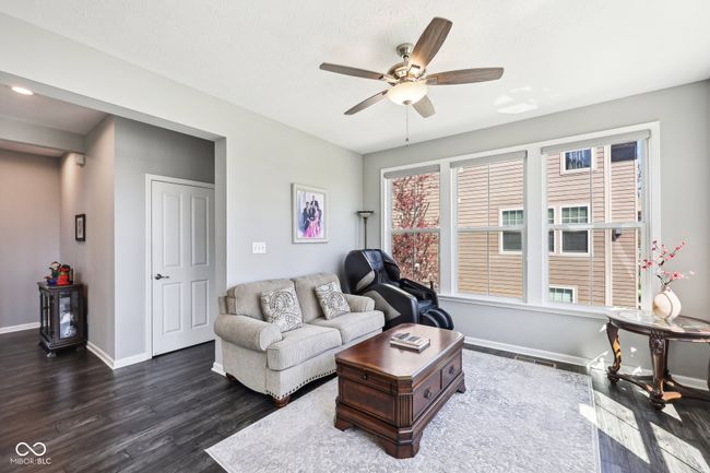The Sun Room extends from the Great Room. | Image 7