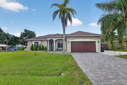 1402 Sw Abingdon Ave, Port St. Lucie, FL, 34953-2544 | Card Image