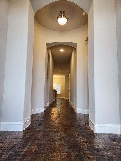 Corridor with dark hardwood / wood-style flooring | Image 2