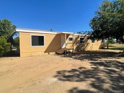 Front of home. All new siding, skirting, covered patio and roof! | Image 1