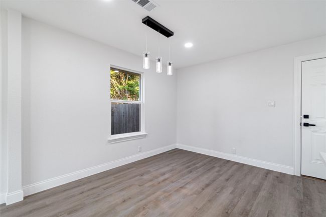 Unfurnished room with light wood-type flooring | Image 17