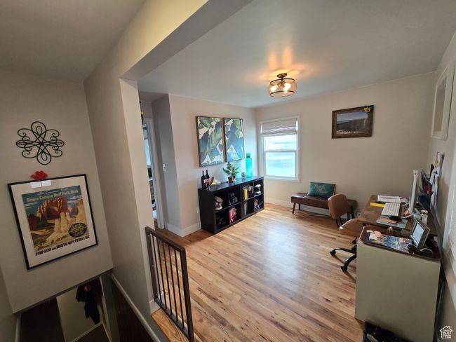 Office area featuring baseboards and wood finished floors | Image 23