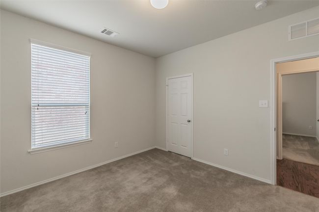 2nd bedroom featuring carpet | Image 12