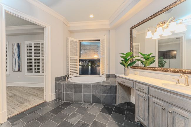 Bathroom with vanity, crown molding, a garden tub, and recessed lighting | Image 25