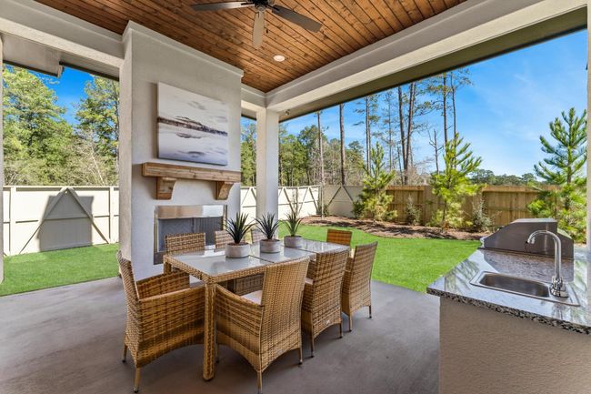 Covered "Outdoor Living" with fireplace and kitchen | Image 17
