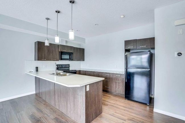 201 - 70 Saddlestone Dr Ne, Townhouse with 2 bedrooms, 3 bathrooms and 1 parking in Calgary AB | Image 8